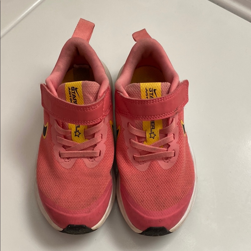 Girls coral Nike sneakers size 11